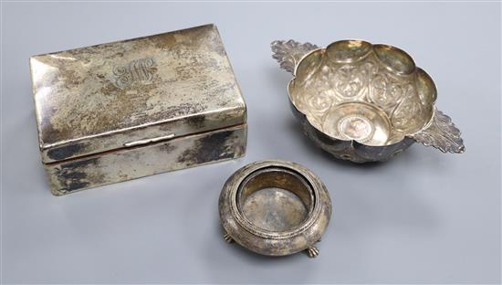 An Edwardian silver cigarette box, London, 1908, a Victorian silver salt and a continental white metal dish.